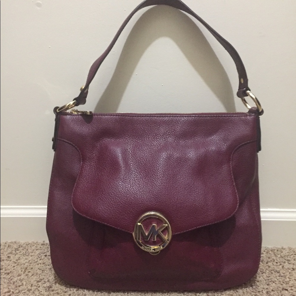 Michael Kors burgundy leather handbag. Nice color!